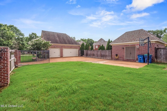 4050 Robinson Xing, Olive Branch, MS 38654 - view of yard with driveway and a garage