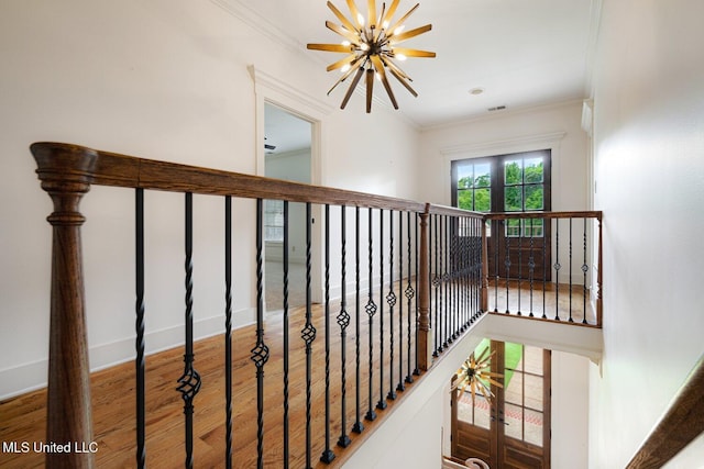 4050 Robinson Xing, Olive Branch, MS 38654 - stairway featuring ornamental molding and wood finished floors
