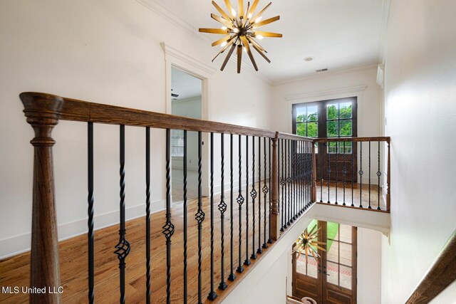 4050 Robinson Xing, Olive Branch, MS 38654 - stairway featuring ornamental molding and wood finished floors