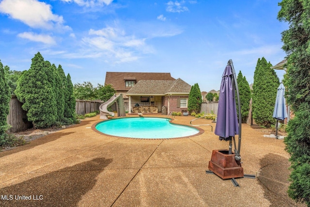 4050 Robinson Xing, Olive Branch, MS 38654 - view of pool featuring a water slide and a patio