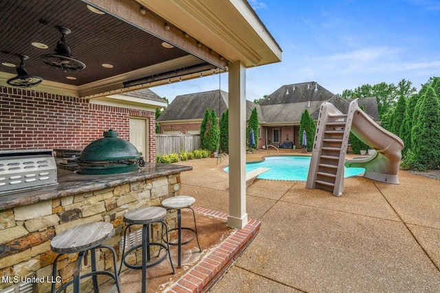 4050 Robinson Xing, Olive Branch, MS 38654 - view of patio featuring a bar and a ceiling fan