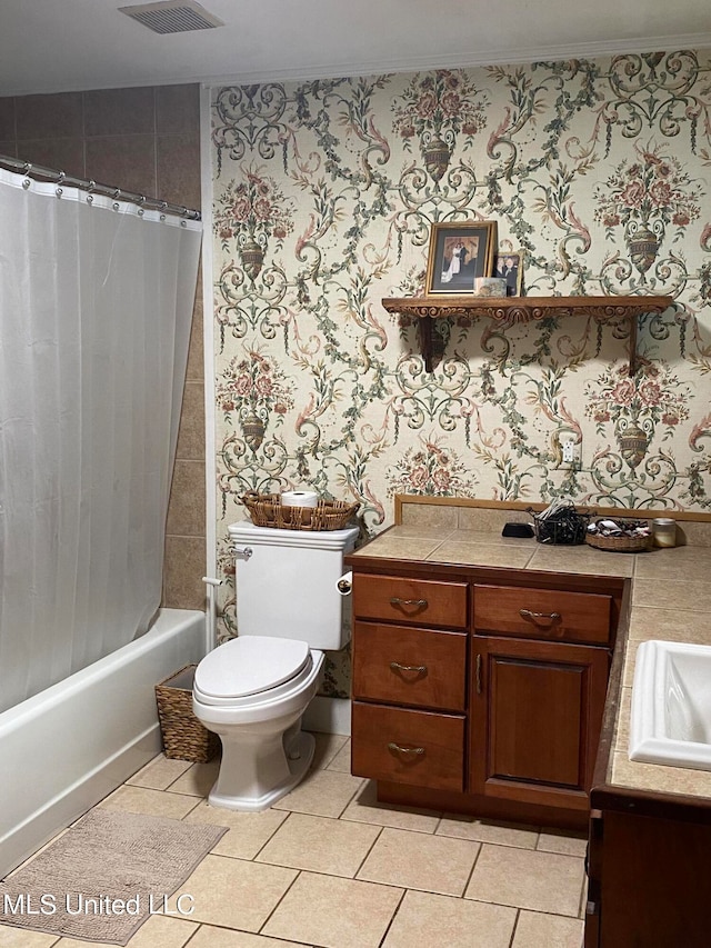 full bathroom with vanity, toilet, shower / tub combo, and tile patterned flooring