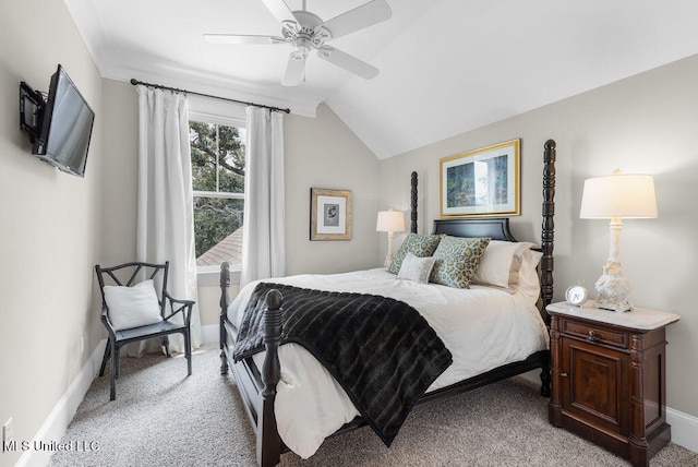 carpeted bedroom with ceiling fan and lofted ceiling