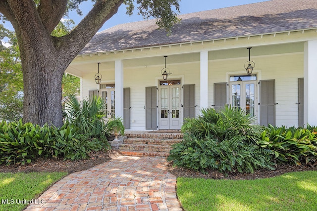 doorway to property with covered porch