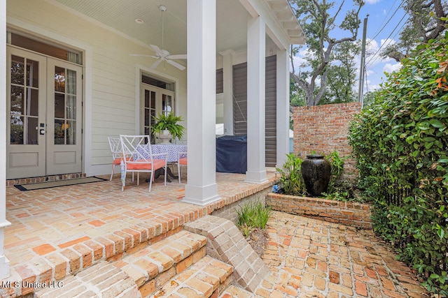 view of patio featuring ceiling fan