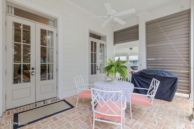 view of patio / terrace with french doors, ceiling fan, and area for grilling