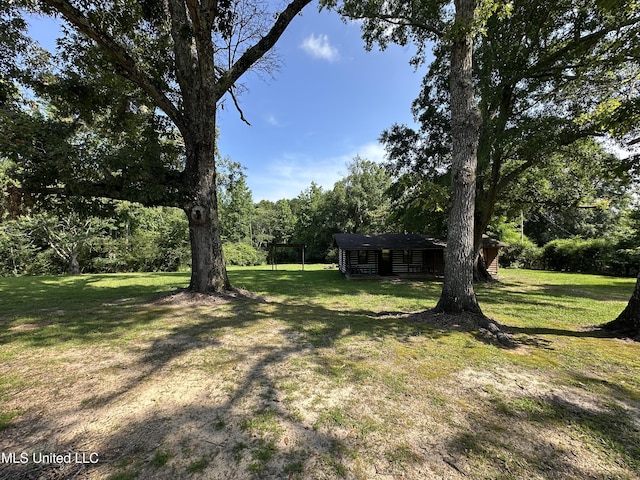 1628 Dry Creek Rd, Magee, MS 39111 - view of grassy yard featuring an outdoor structure
