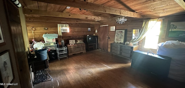 1628 Dry Creek Rd, Magee, MS 39111 - bedroom featuring wooden ceiling with exposed beams, wooden walls, and dark wood finished floors