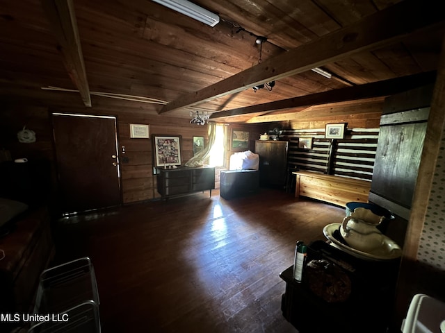 1628 Dry Creek Rd, Magee, MS 39111 - living room with wooden walls, wooden ceiling with exposed beams, and dark wood finished floors