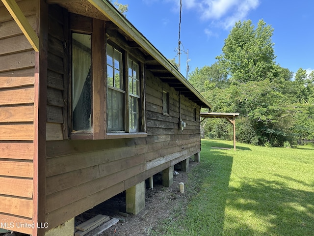 1628 Dry Creek Rd, Magee, MS 39111 - view of property exterior with a lawn