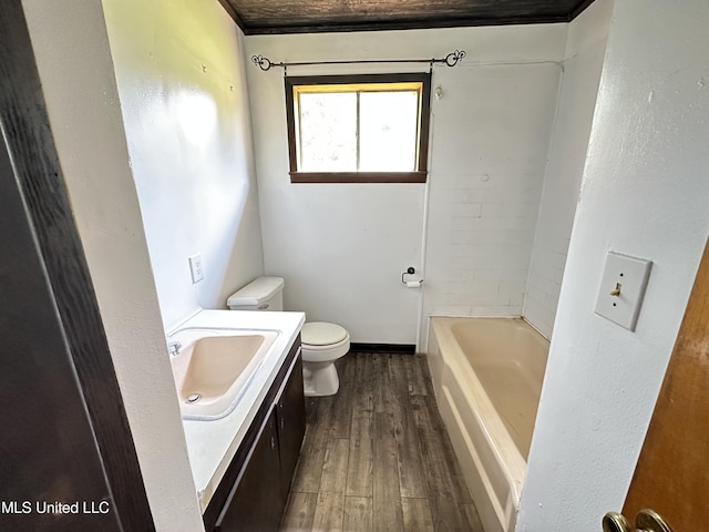 1628 Dry Creek Rd, Magee, MS 39111 - bathroom with toilet, wood finished floors, a tub, vanity, and a shower