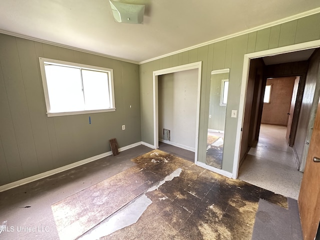 1628 Dry Creek Rd, Magee, MS 39111 - unfurnished bedroom featuring baseboards and ornamental molding
