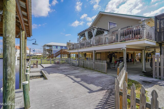 view of home's community featuring a wooden deck