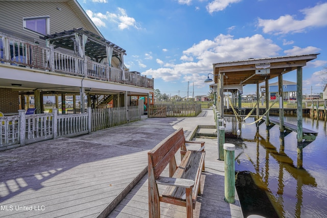 dock area with a deck with water view