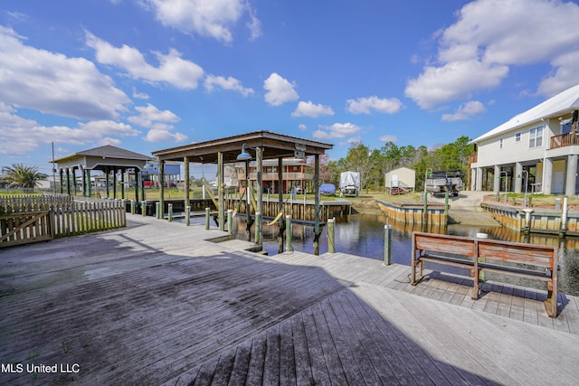 dock area with a water view