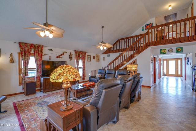 living room with high vaulted ceiling, light tile patterned floors, and ceiling fan