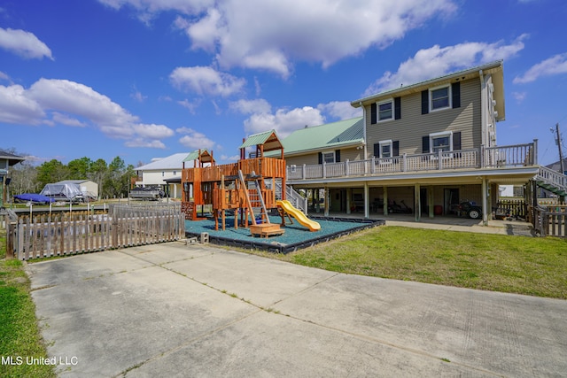 view of play area featuring a yard