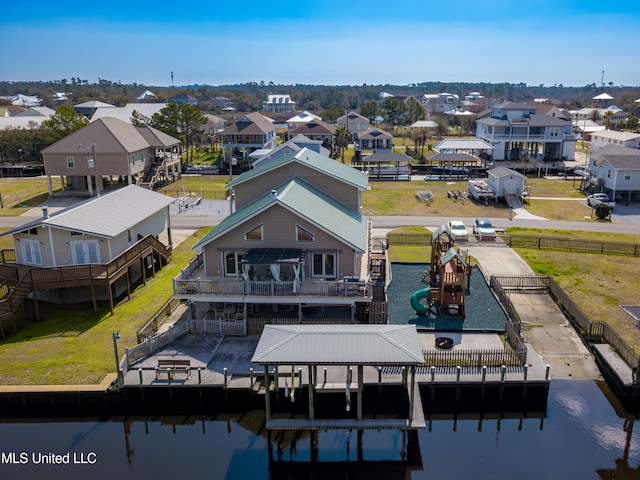 drone / aerial view featuring a water view