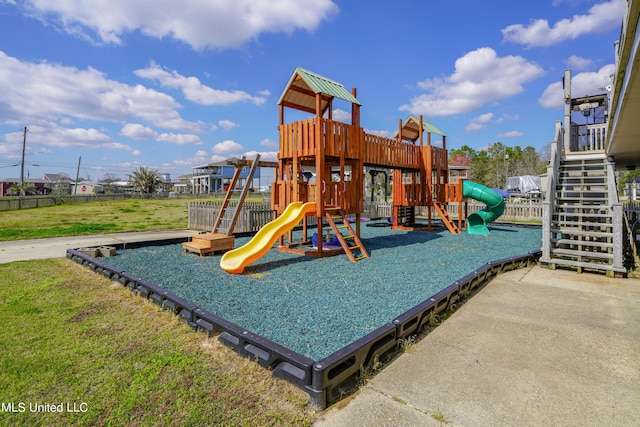 view of jungle gym featuring a yard