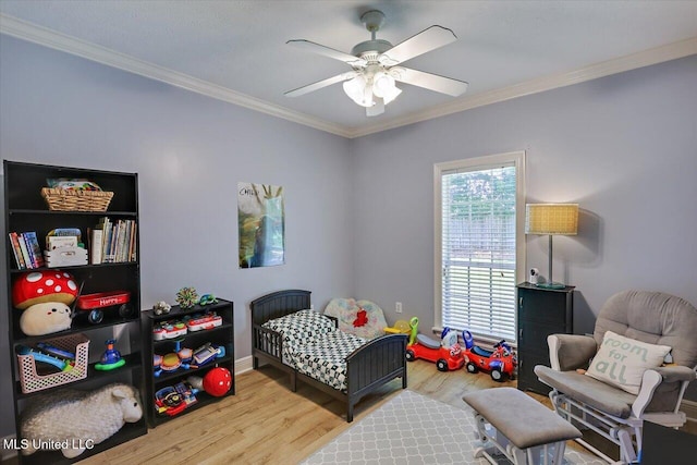 213 Pecan Cir, Brandon, MS 39042 - bedroom featuring wood finished floors, crown molding, baseboards, and ceiling fan