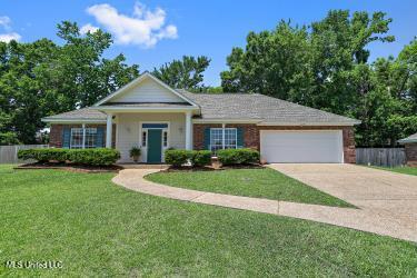 213 Pecan Cir, Brandon, MS 39042 - view of front of property featuring a garage and concrete driveway