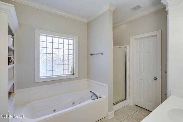 213 Pecan Cir, Brandon, MS 39042 - full bathroom with a tub with jets, healthy amount of natural light, a stall shower, tile patterned floors, and crown molding