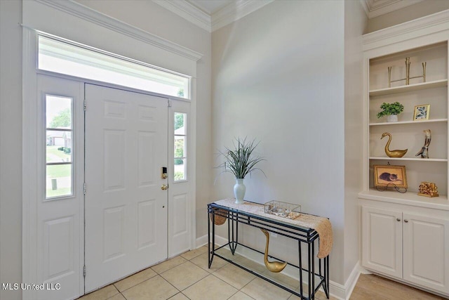 213 Pecan Cir, Brandon, MS 39042 - entryway with light tile patterned floors, ornamental molding, and baseboards