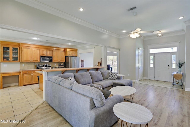 213 Pecan Cir, Brandon, MS 39042 - living area featuring ornamental molding, light wood-type flooring, ceiling fan, recessed lighting, and baseboards