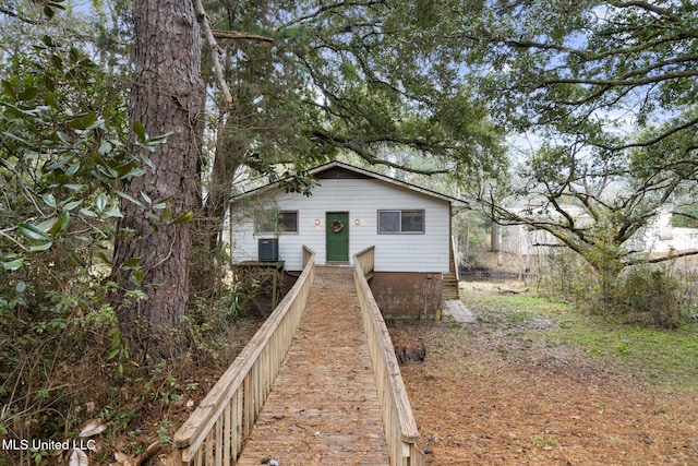 view of front of property featuring central air condition unit