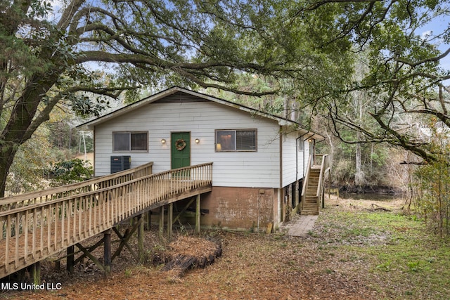 view of front of house with a wooden deck