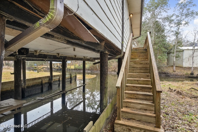 view of dock with a water view