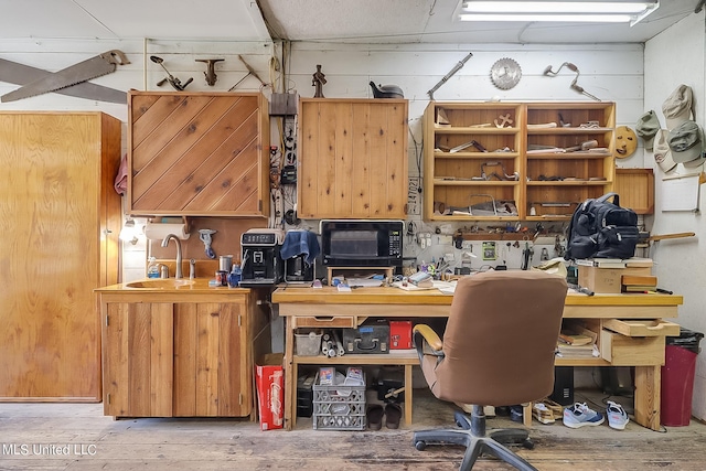 1728 21st St, Gulfport, MS 39501 - office featuring a sink, hardwood / wood-style flooring, and a workshop area