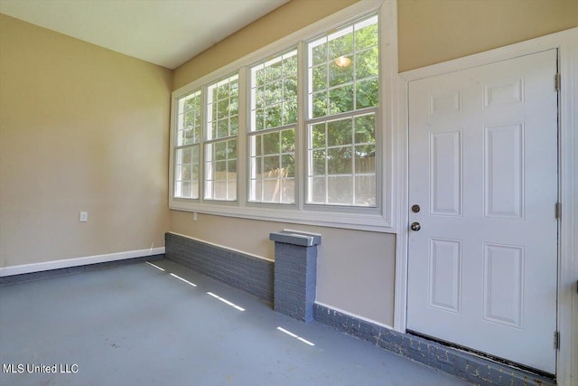 1204 Jackson St, Vicksburg, MS 39183 - interior space with concrete flooring and baseboards