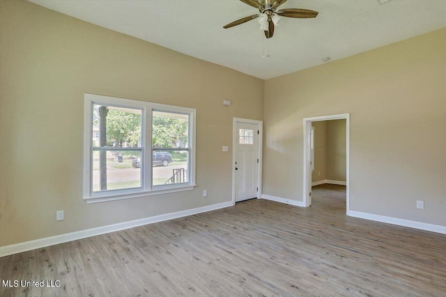 1204 Jackson St, Vicksburg, MS 39183 - interior space featuring a ceiling fan, baseboards, and wood finished floors