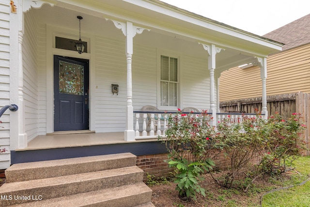 729 N Pearl St, Natchez, MS 39120 - view of exterior entry with a porch