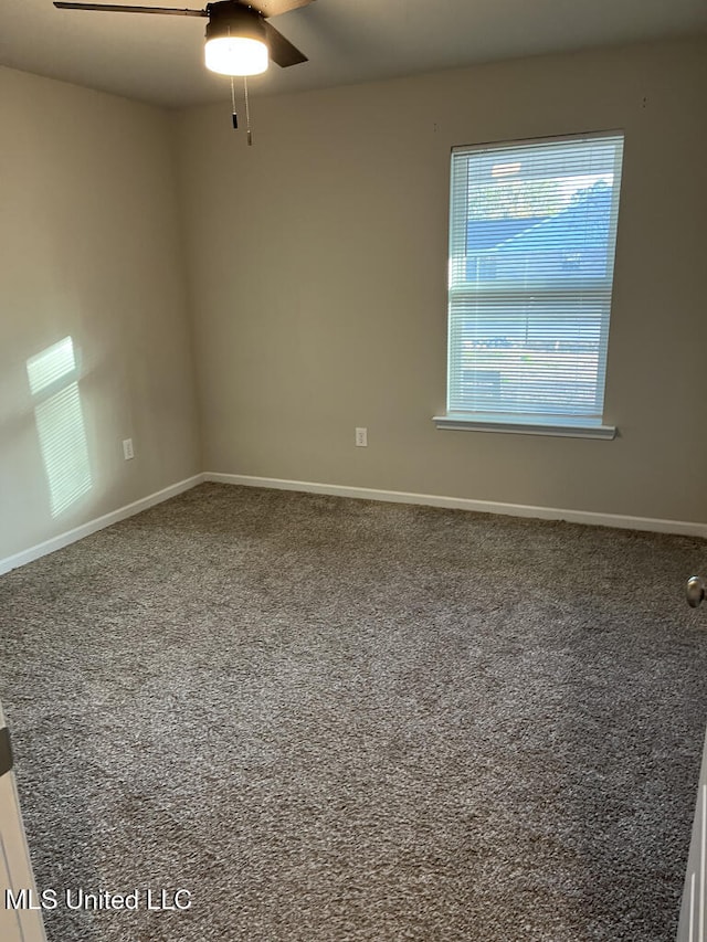 unfurnished room with carpet floors and ceiling fan