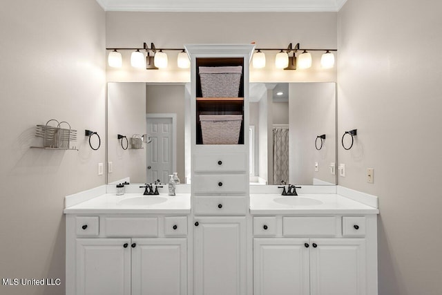 bathroom with vanity and crown molding