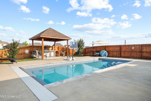 1647 Treestand Rd, Southaven, MS 38672 - view of pool with an outdoor kitchen, a gazebo, a patio area, and a fenced backyard