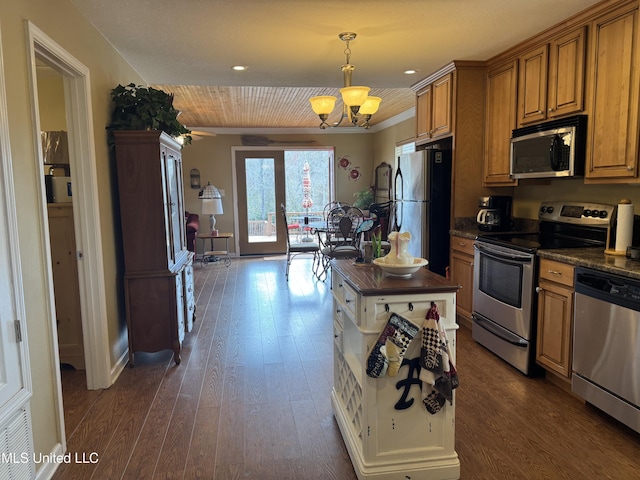 kitchen with pendant lighting, stainless steel appliances, dark hardwood / wood-style floors, and a chandelier