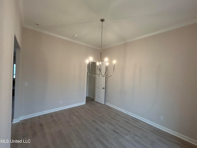 unfurnished dining area featuring crown molding, a chandelier, and hardwood / wood-style floors