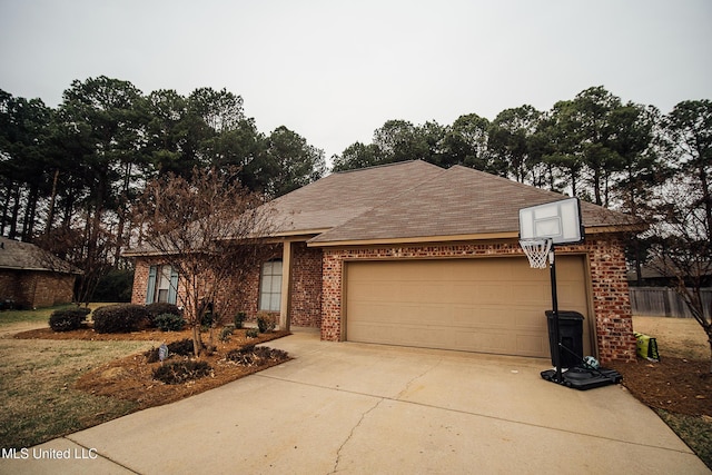 single story home featuring a garage