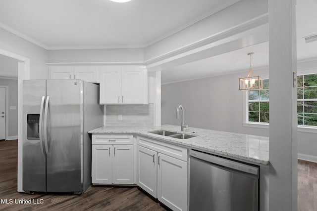 kitchen with backsplash, dark wood-type flooring, white cabinets, sink, and appliances with stainless steel finishes