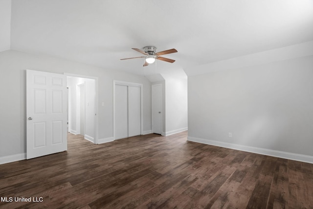 additional living space with dark hardwood / wood-style flooring, ceiling fan, and lofted ceiling