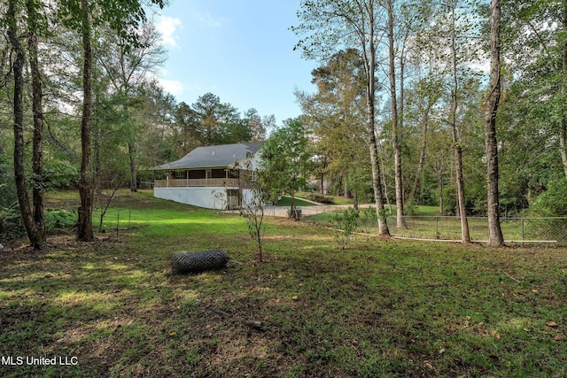 view of yard with a sunroom