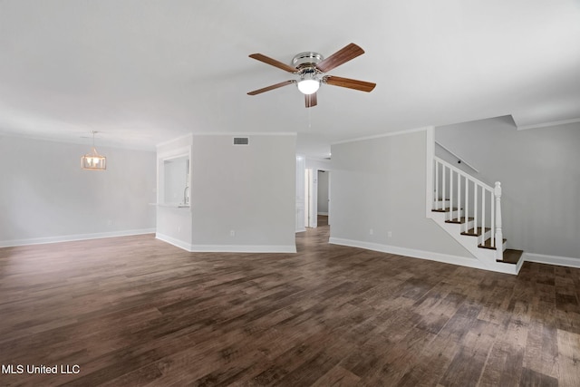 unfurnished living room with dark hardwood / wood-style floors, ceiling fan, and ornamental molding