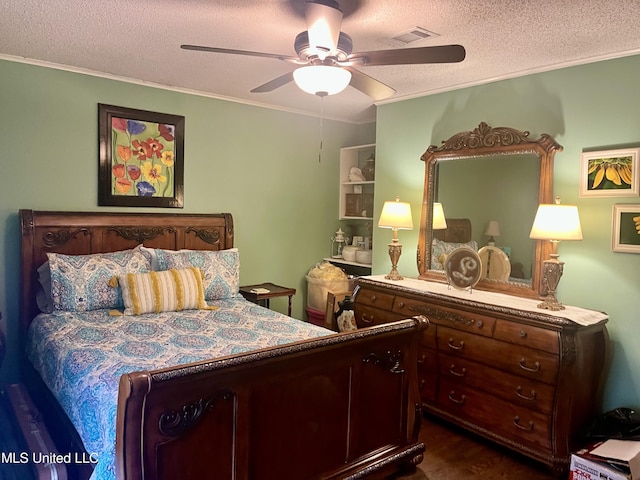 506 Holmes St, Belzoni, MS 39038 - bedroom with a textured ceiling, dark wood-style floors, crown molding, and ceiling fan