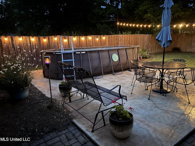 506 Holmes St, Belzoni, MS 39038 - fenced backyard with a patio area