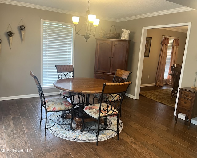 506 Holmes St, Belzoni, MS 39038 - dining room featuring dark wood finished floors, a chandelier, and crown molding