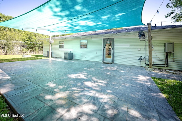 209 Audrey Cir, Ocean Springs, MS 39564 - back of property with cooling unit and a patio