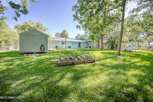 209 Audrey Cir, Ocean Springs, MS 39564 - view of yard with a vegetable garden